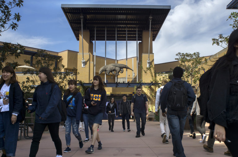 Students walking in front of the student center